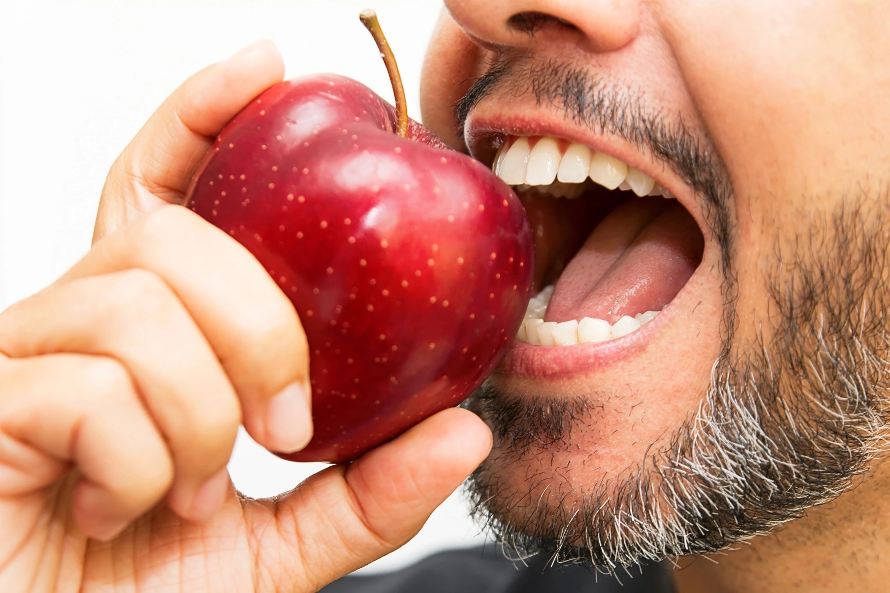 Illustrative everyday smile and eating, not a treatment result.